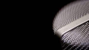 Microphone on black background