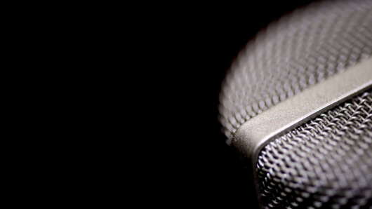 Microphone on black background