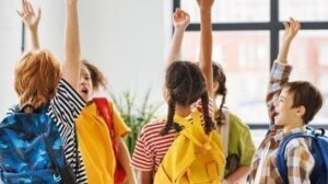 Primary School Age Children high fiving