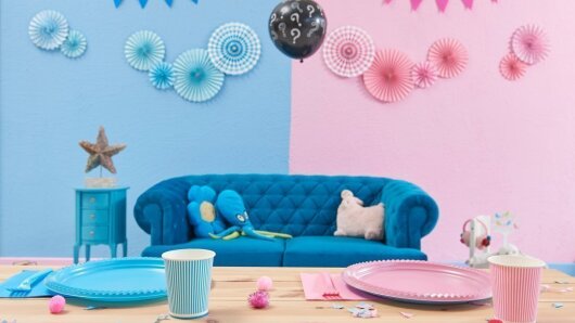A sofa for children with toys around it