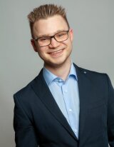 Portraitphoto von Tim Haas